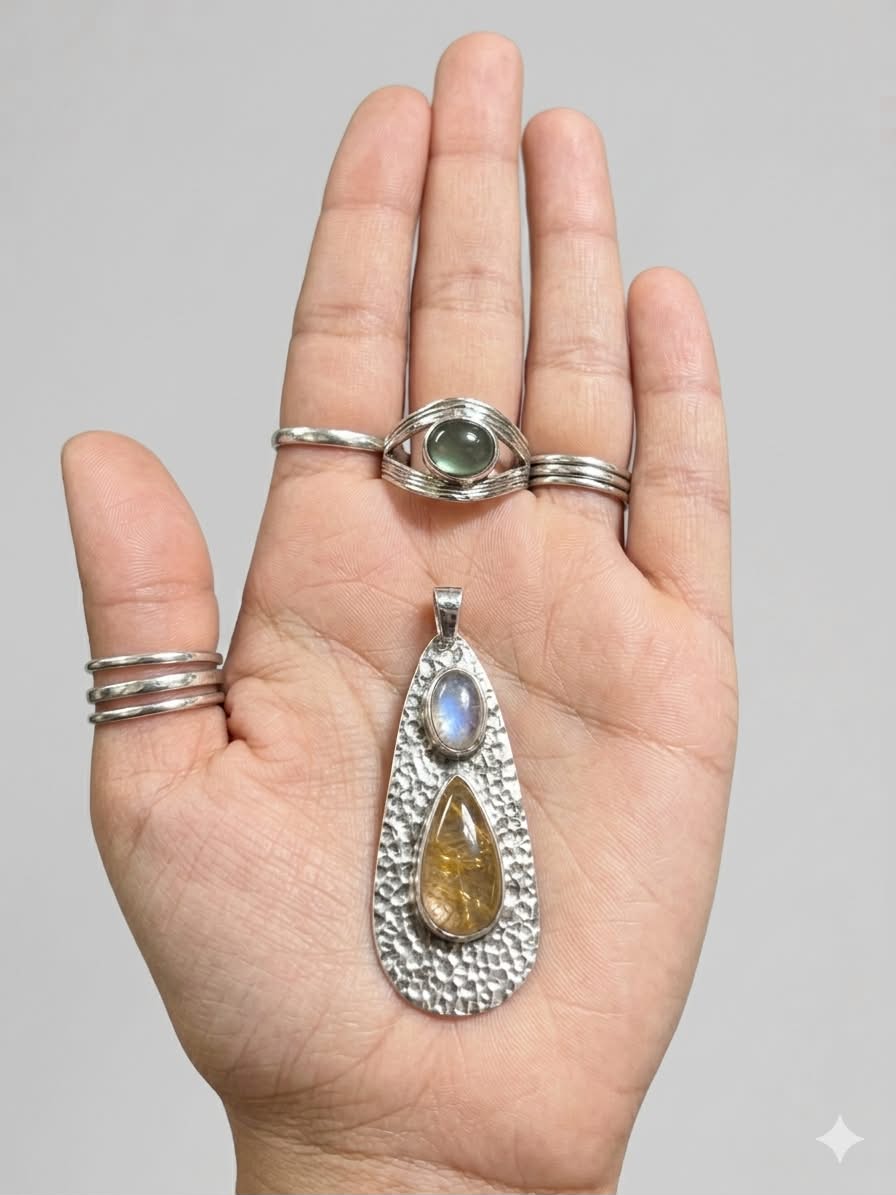Eye ring and stone pendant