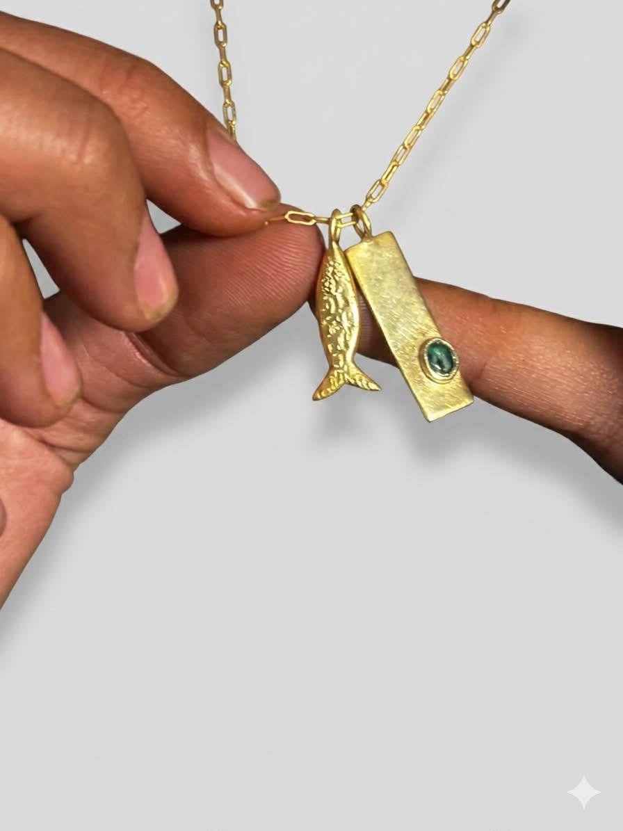 Fish charm necklace